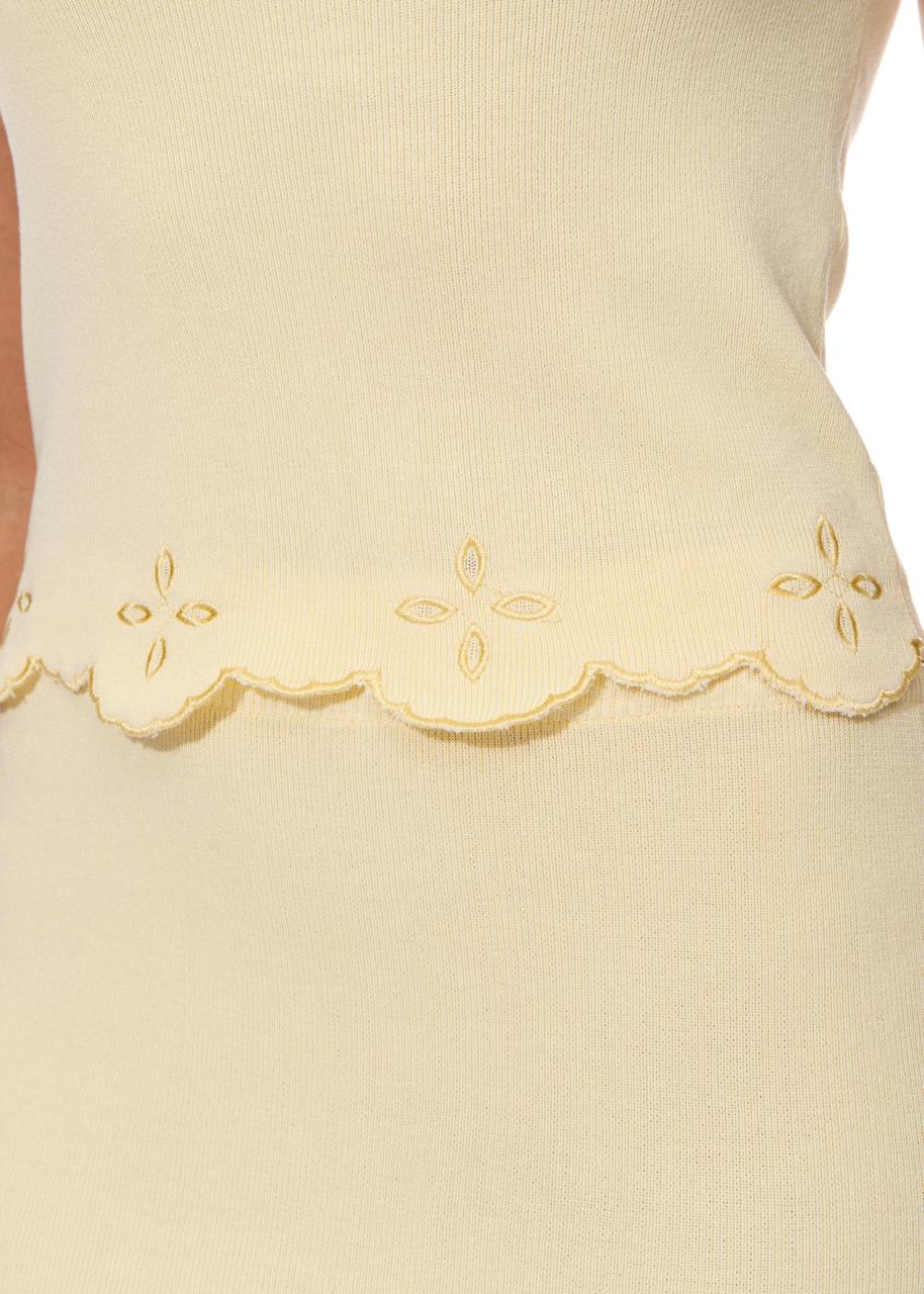 Detalle del set amarillo de punto, vista en textura y acabado, Moona House