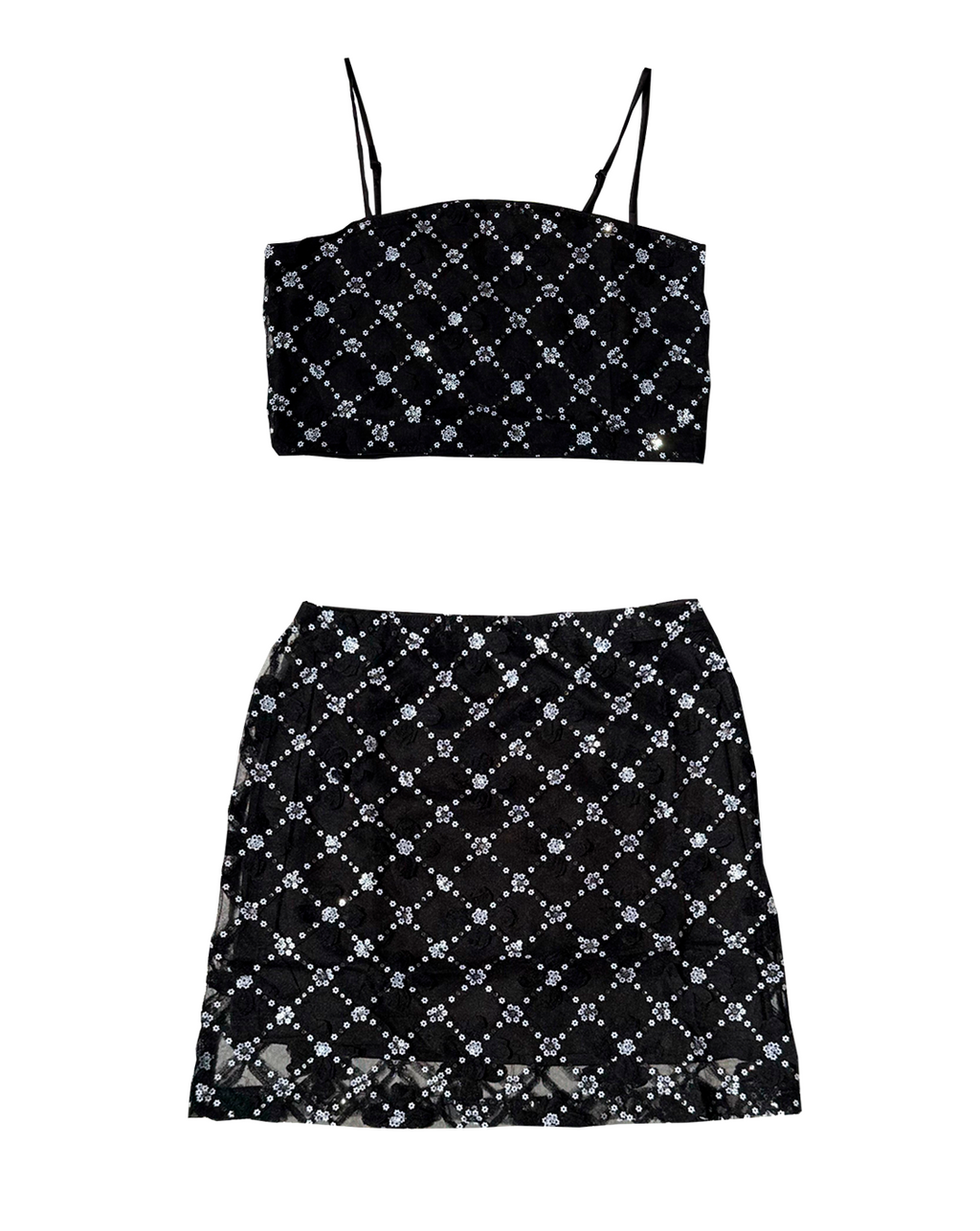 Set negro casual de mujer con crop top y falda, detalles florales brillantes Moona House.